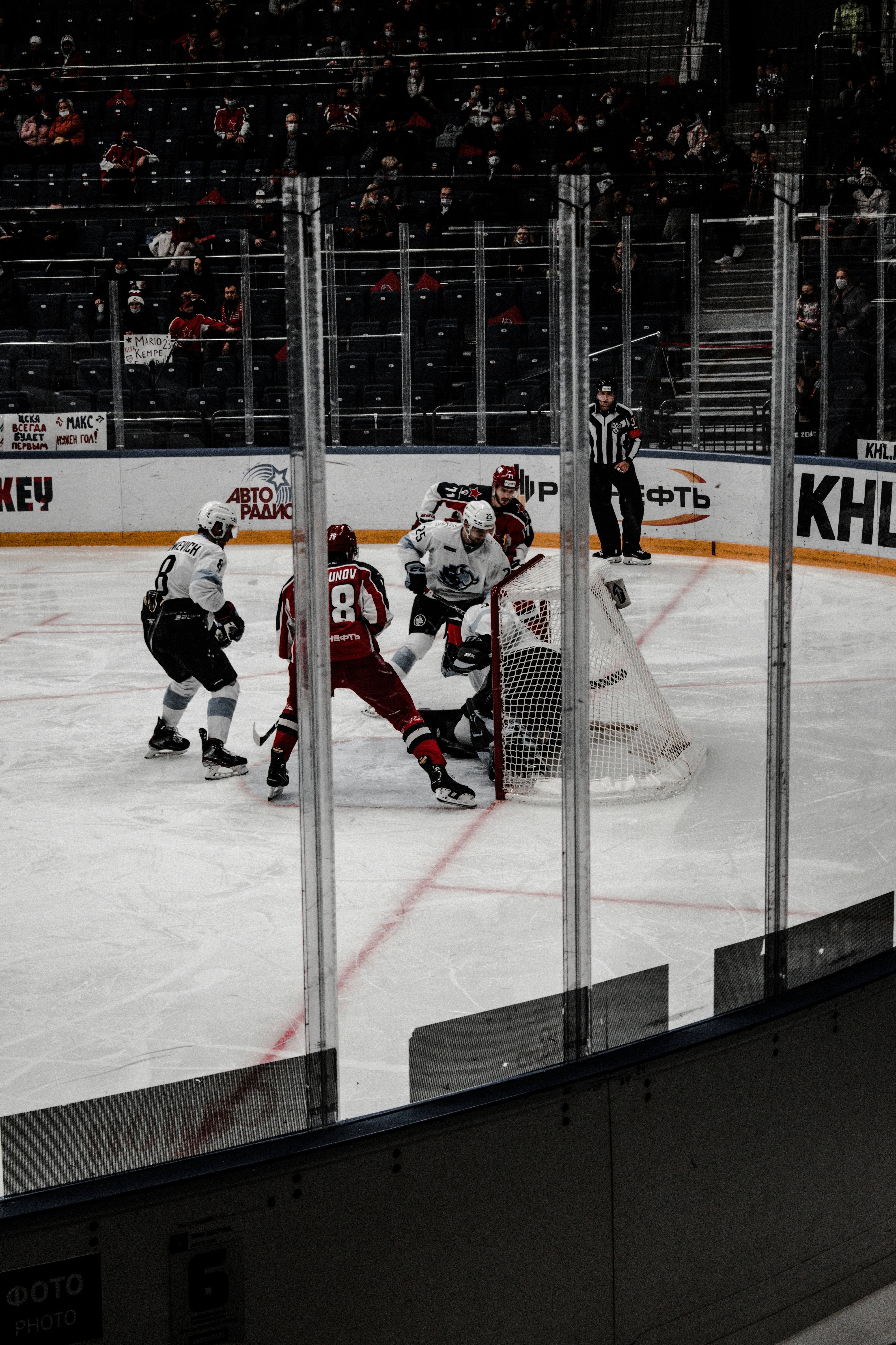 ice hockey players on ice hockey field